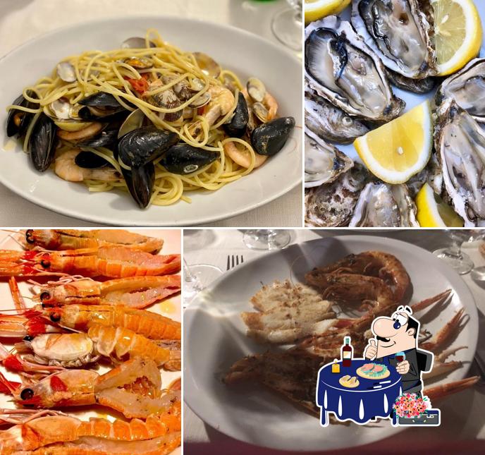 Kostet Meeresfrüchte bei Osteria Der Belli Piras Valentino e C