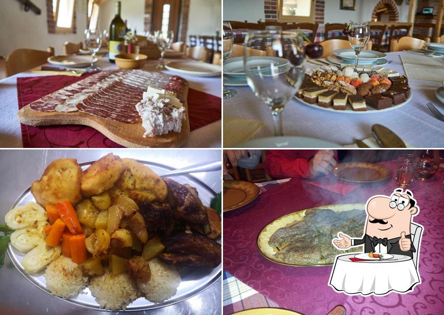 Guarda la immagine che presenta la tavolo da pranzo e cibo di Turistična kmetija Karničnik