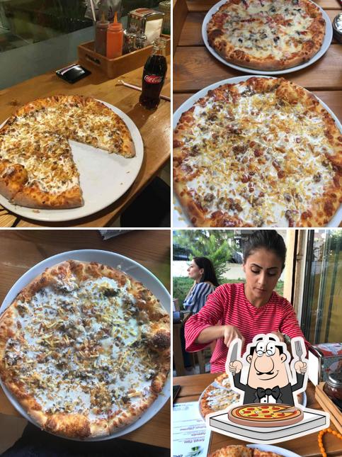 En Bronzo Pizza, puedes disfrutar de una pizza