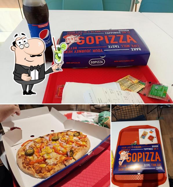 Enjoy a beverage at GOPIZZA Forum Falcon City