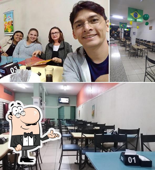 O interior do Frango Frito & Pizzaria