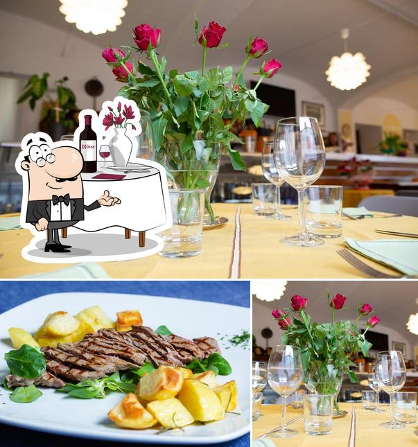 La immagine di tavolo da pranzo e la carne da Osteria del Bagatto Sas di Lucio Giorgio e C