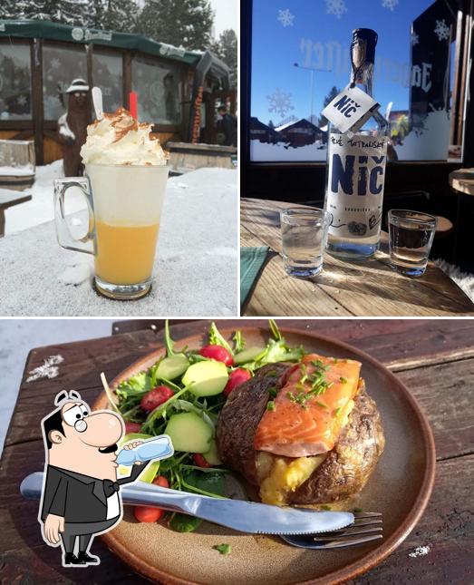 The picture of drink and meat at Apres ski bar