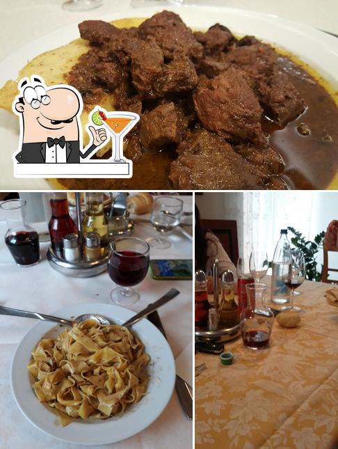 La immagine della bevanda e cibo di Trattoria Al Lago