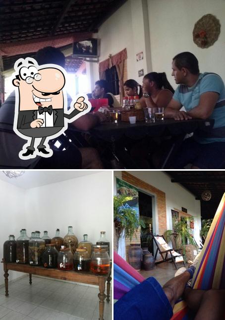 A foto do Cachaçaria e Restaurante Banguê’s interior e balcão de bar