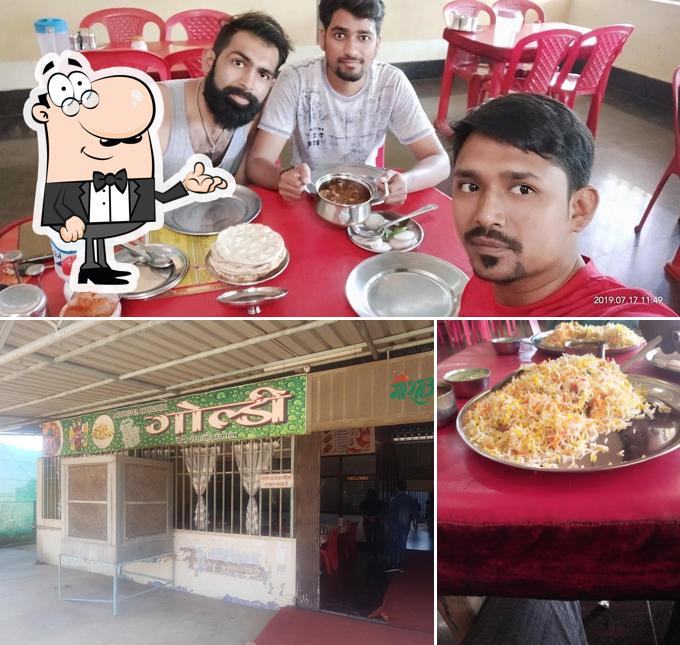 Take a seat at one of the tables at GOLDI DHABA KESHKAL
