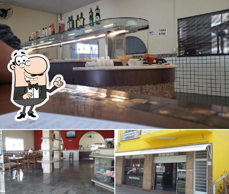 Entre diferentes coisas, interior e comida podem ser encontrados no Restaurante Suindara Ii