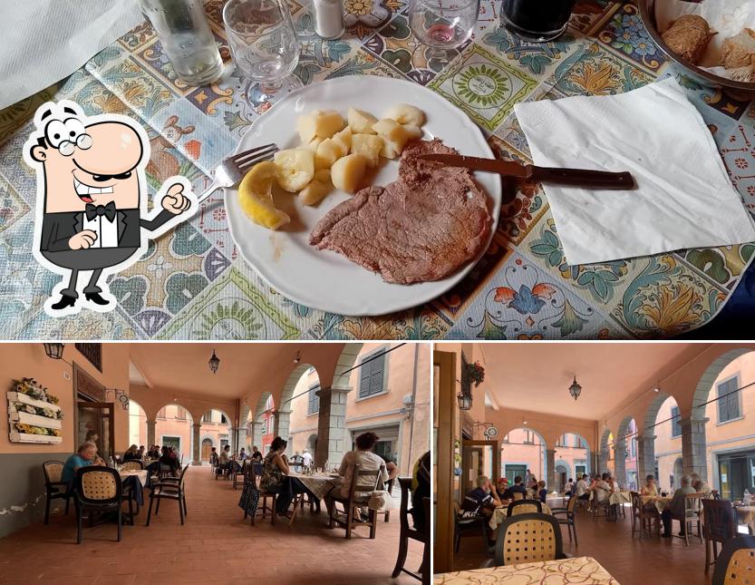 Questa è la immagine che raffigura la interni e cibo di Trattoria Marchetti
