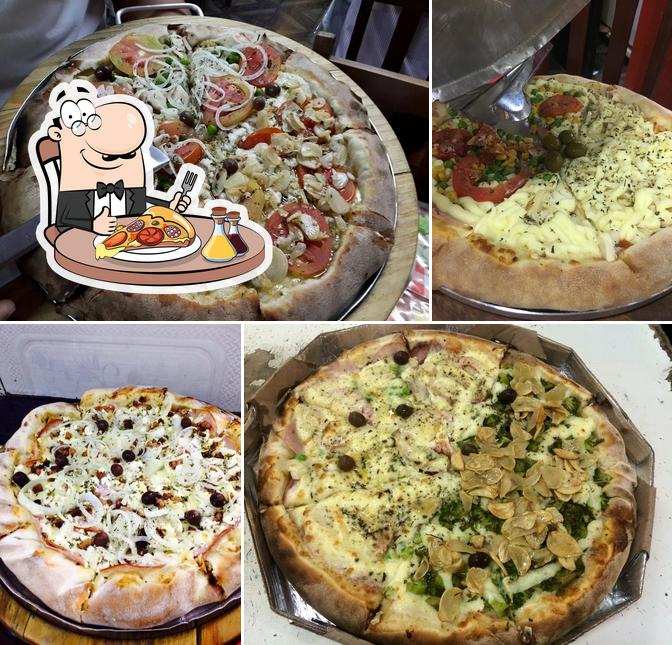 Try out pizza at Churrascaria e Pizzaria Aritana