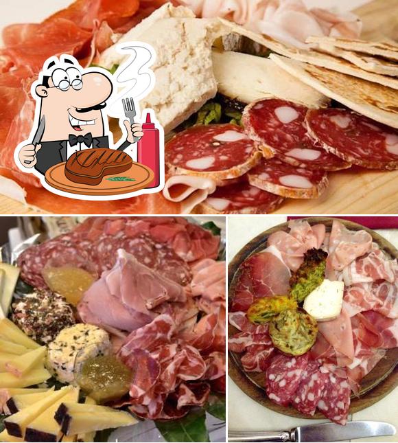 Prenditi i un pasto a base di carne a Pandora Slow Food