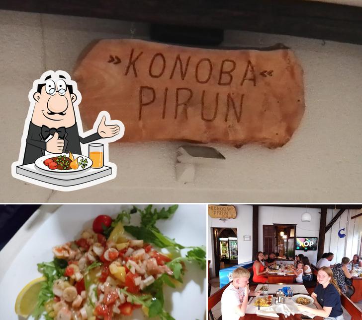 Konoba Pirun si caratterizza per la cibo e tavolo da pranzo