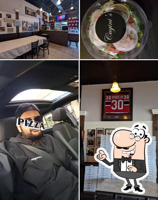 Installez-vous à l'une des tables de Cugini's Pizza