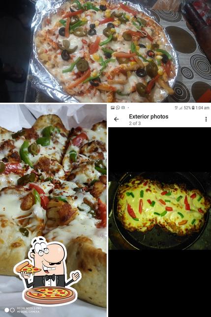 Pick pizza at FAMOUS PIZZA (ZUBAIR BHAI)