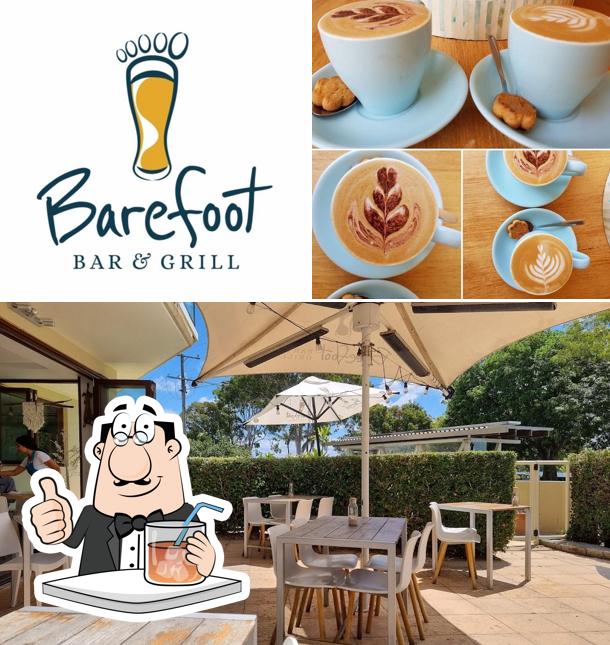 This is the image depicting drink and interior at Barefoot Bar & Grill