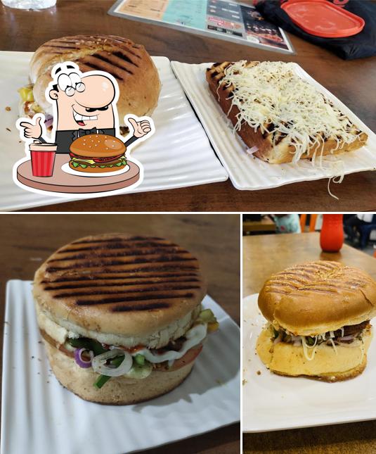 Order a burger at Sandwich House & Cafe