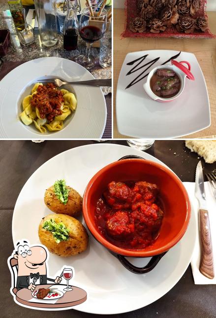 Prenditi i un pasto a base di carne a Trattoria della Posta