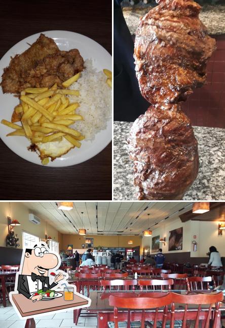 Esta é a imagem ilustrando comida e interior no Churrascaria e Galeto Mário