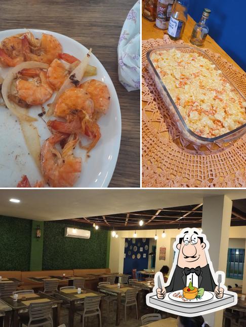 Entre diferentes coisas, comida e interior podem ser encontrados a Panela Imperial Restaurante e Pizzaria