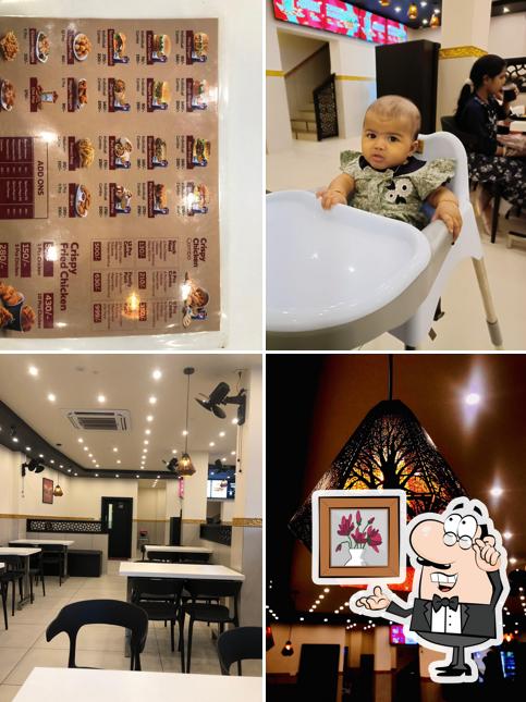 The interior of Yummy Fried Chicken Koppam