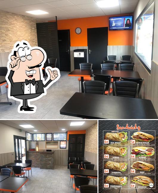 Voici la photo représentant la intérieur et burger sur SUN BURGER SAINT JUST