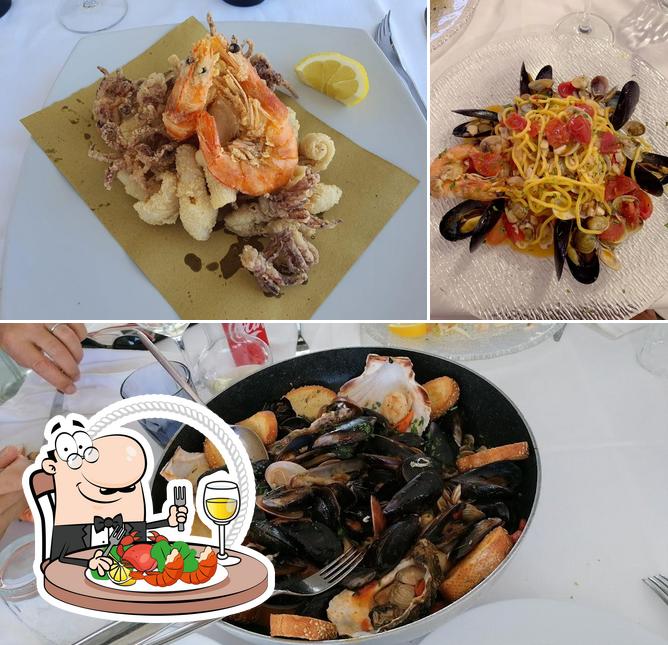 Prenditi la cucina di mare a TI:ORO ristorante musica spiaggia