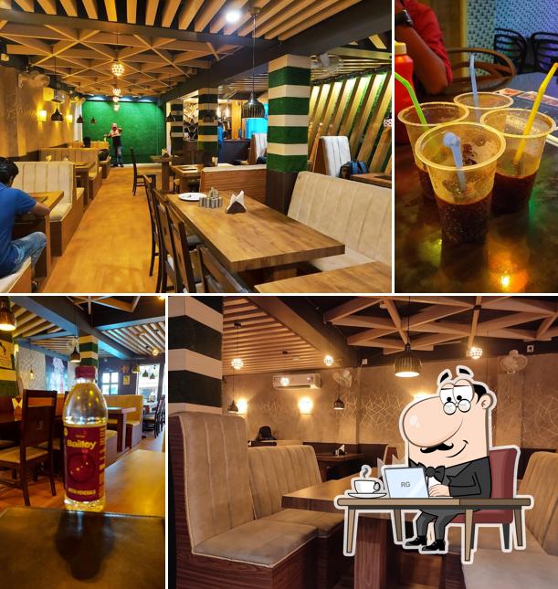 Take a seat at one of the tables at Foodie's Heaven Balurghat