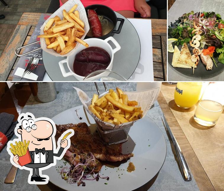 Dégustez des pommes frites à Le Chalet Gourmand