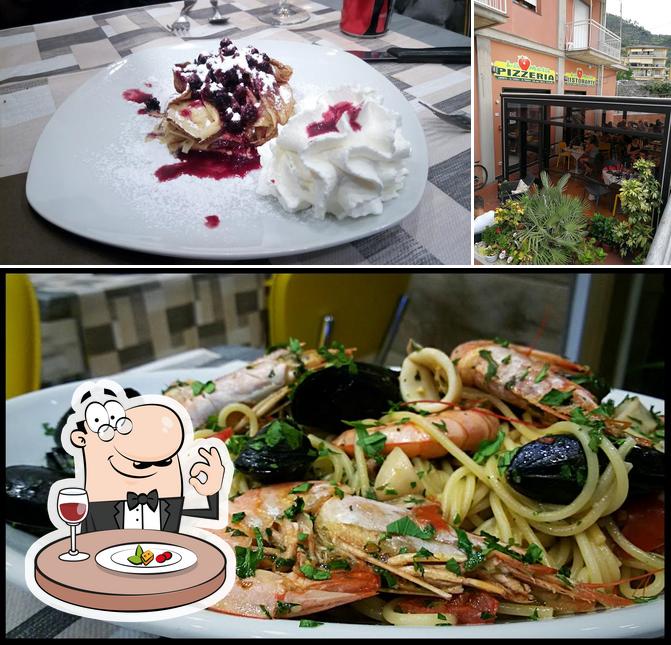 This is the picture displaying food and exterior at La Mela - Pizzeria Ristorante