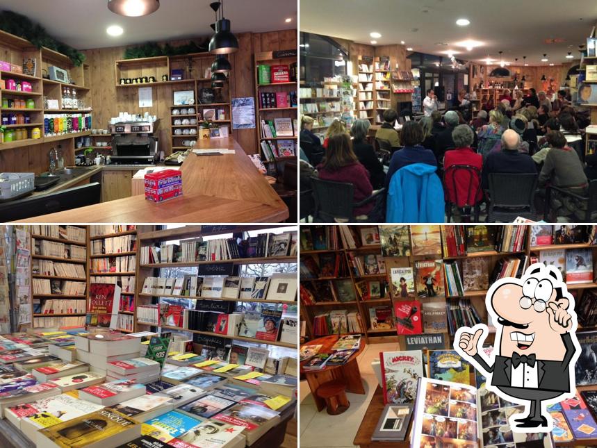 Take a seat at one of the tables at Librairie Pré du Lac