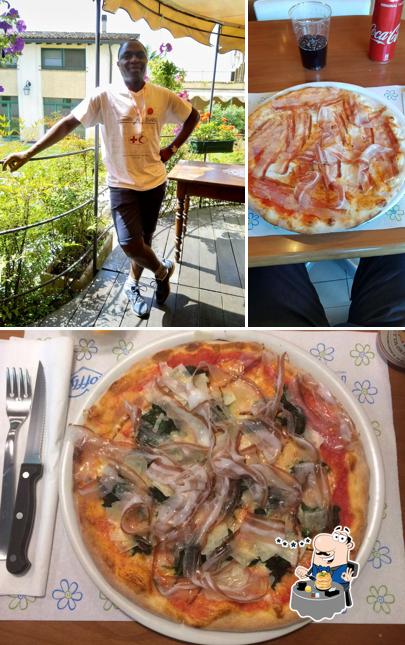 Questa è la immagine che raffigura la cibo e esterno di Pizza D'Autore