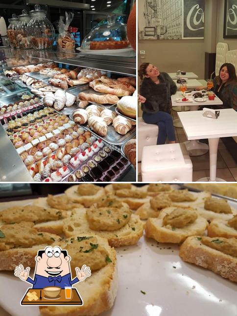 Questa è la immagine che presenta la cibo e tavolo da pranzo di Bar Pasticceria Paoletti Di Paoletti Riccardo