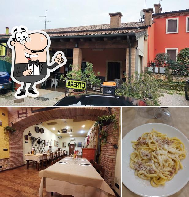 Questa è la immagine che presenta la interni e esterno di Trattoria Al Monte