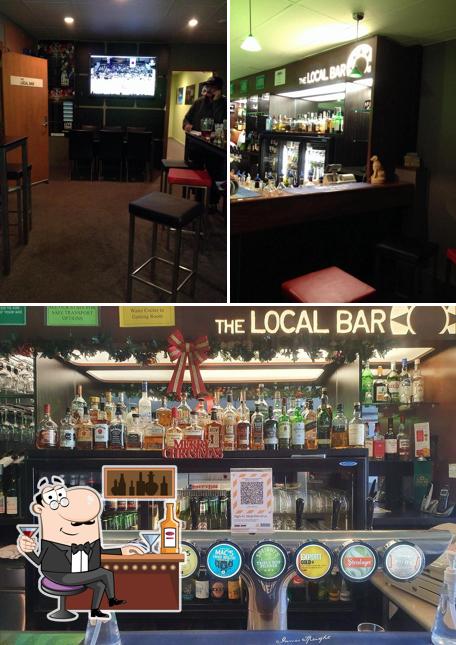 Check out the photo depicting bar counter and interior at The Local Bar