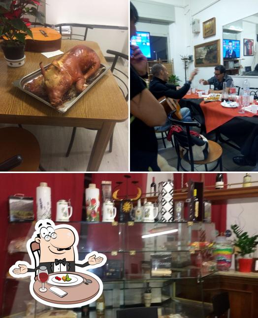 La foto della tavolo da pranzo e interni di Circolo Sardegna " Caras "