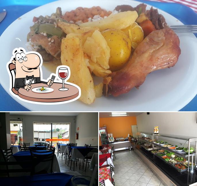 A imagem da comida e interior no Cheiro Mineiro