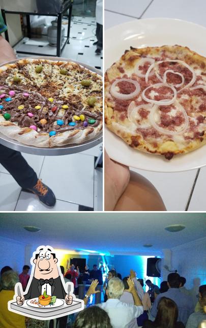 A imagem do Pizza In House’s comida e interior