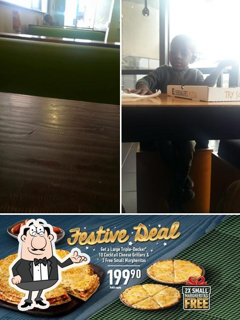 Las fotografías de interior y comida en Debonairs Pizza