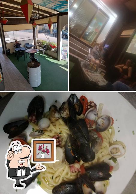 Questa è la foto che raffigura la interni e frutti di mare di L'incontro