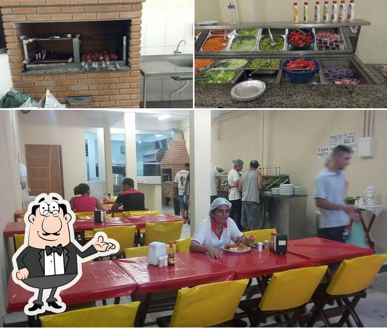 Dê uma olhada a foto mostrando interior e comida a Restaurante Viana