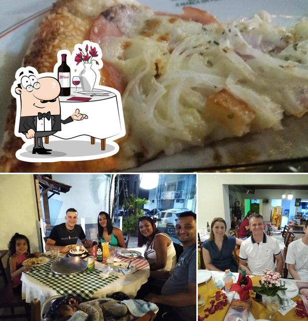 A foto da mesa de jantar e comida a Don Raffaelo São João da Boa Vista