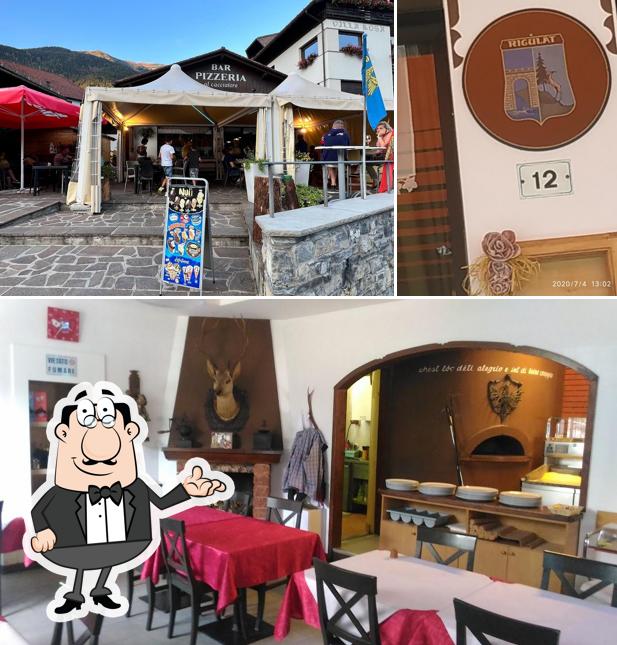 Dai un'occhiata agli interni di Pizzeria Bar Ristorante Al Cacciatore