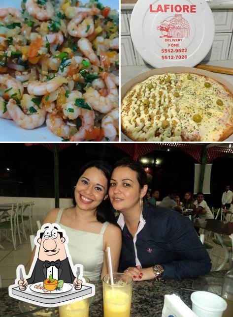 Entre diversos coisas, comida e interior podem ser encontrados a Lafiore Pizzaria