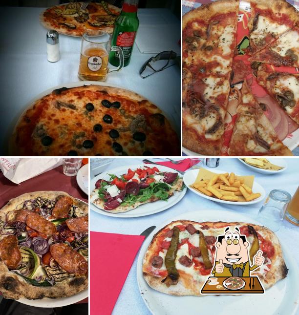Prenditi una pizza a IL CAMPIONE "Ristorante - Pizzeria"