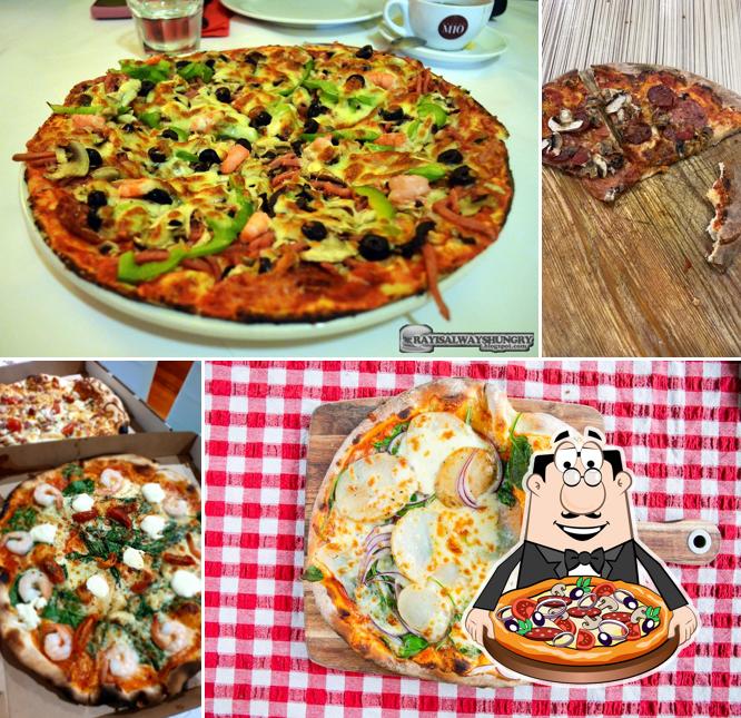 Get pizza at Carmelo's Wood Fired Pizza