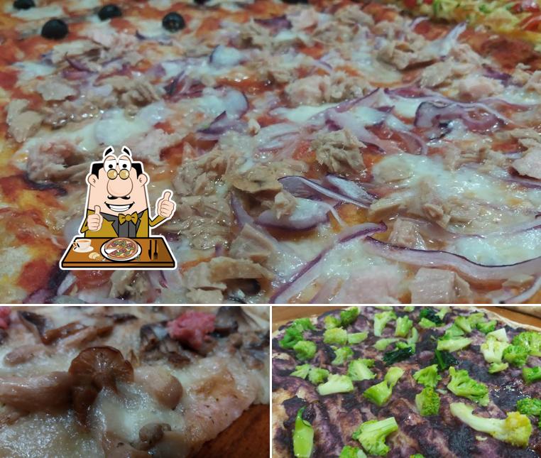 A Pizzeria Asso Di Cuori, puoi assaggiare una bella pizza