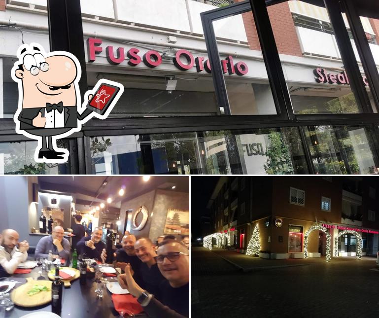 La immagine della esterno e bancone da bar di Fuso Orario