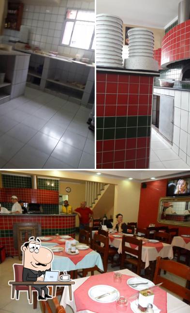 O interior do Pizzaria Bella Roma