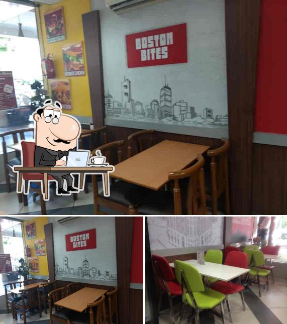 Take a seat at one of the tables at Boston Bites