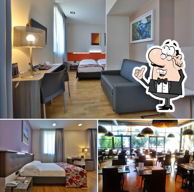 Siediti a un tavolo di Best Western Falck Village Hotel