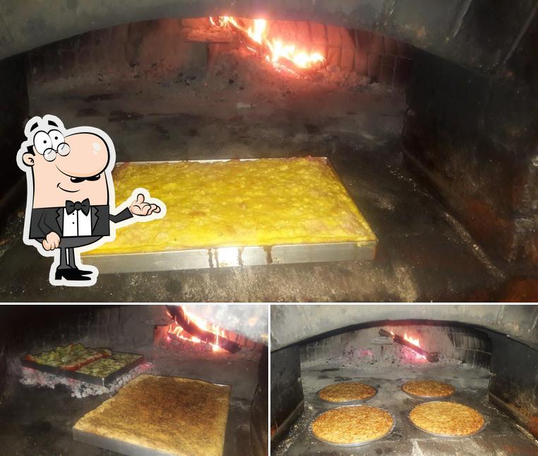 Pizzeria U Fainottu Du Caruggiu si caratterizza per la interni e cibo